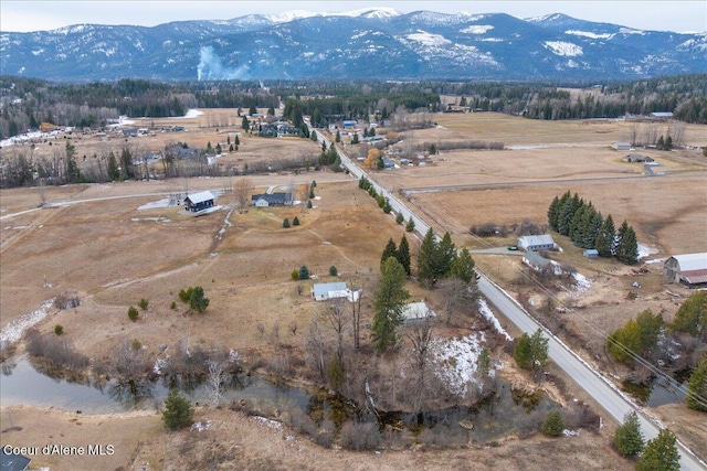 bird's eye view featuring a mountain view and a rural view