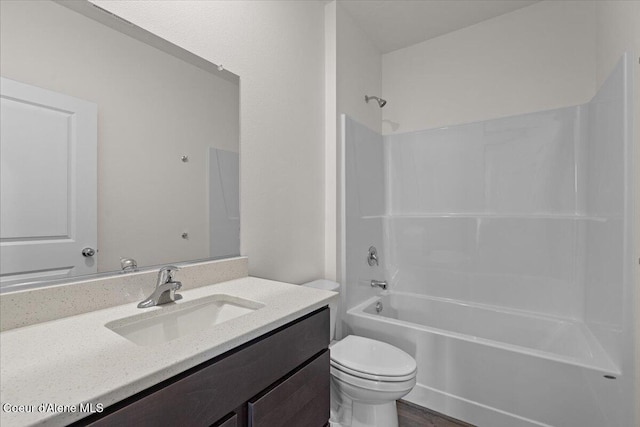 full bath with toilet, shower / bath combination, and vanity