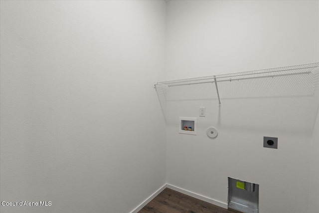 laundry area featuring baseboards, dark wood-style flooring, laundry area, electric dryer hookup, and hookup for a washing machine