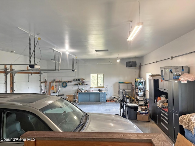 422 Lightning Peak Rd, Sandpoint, ID 83864 - garage featuring a garage door opener