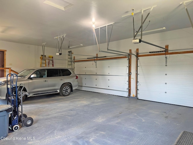 422 Lightning Peak Rd, Sandpoint, ID 83864 - garage featuring a garage door opener