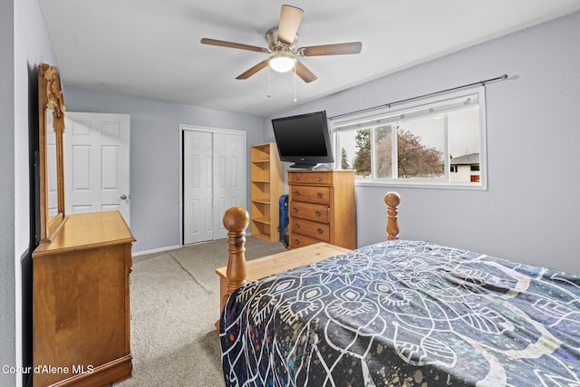 carpeted bedroom with a closet and ceiling fan
