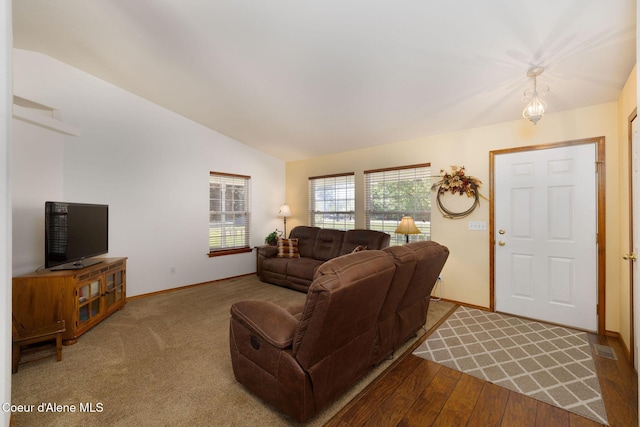 5904 N 15th St, Dalton Gardens, ID 83815 - living room with vaulted ceiling, baseboards, and wood finished floors