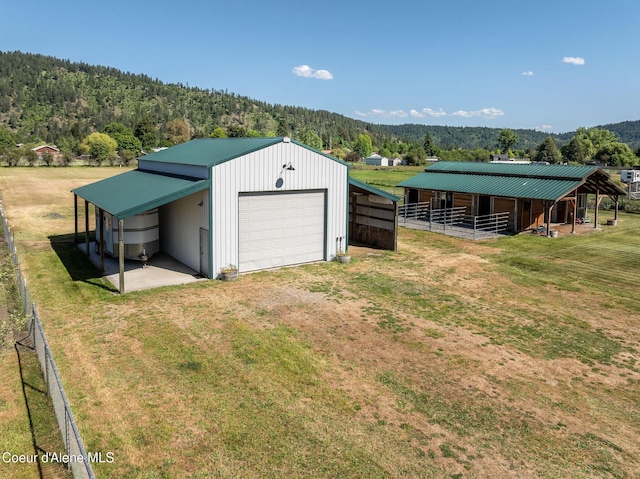 5904 N 15th St, Dalton Gardens, ID 83815 - view of outbuilding featuring a forest view and dirt driveway