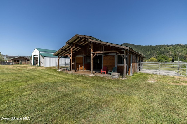 5904 N 15th St, Dalton Gardens, ID 83815 - view of outbuilding featuring an exterior structure and a wooded view