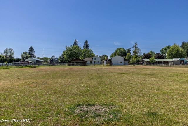 5904 N 15th St, Dalton Gardens, ID 83815 - view of yard featuring an outdoor structure