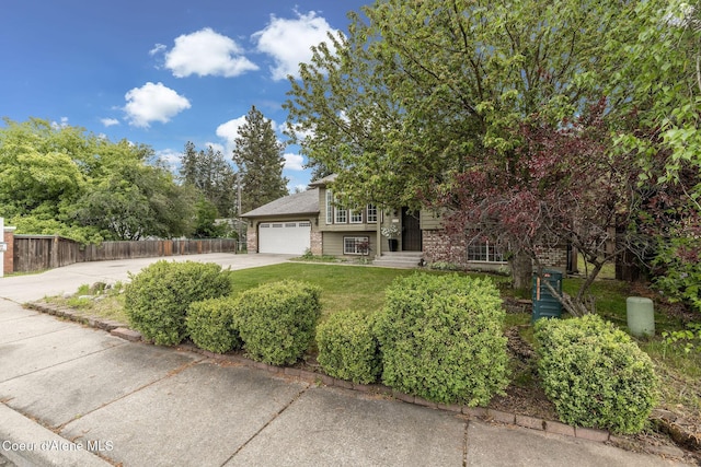 405 W 22nd Ave, Post Falls, ID 83854 - view of front of home featuring driveway and an attached garage