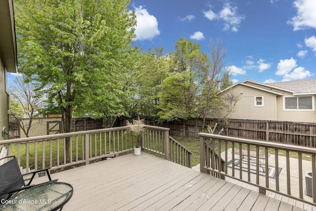 405 W 22nd Ave, Post Falls, ID 83854 - deck featuring an outdoor structure and a storage unit
