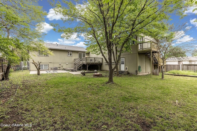 405 W 22nd Ave, Post Falls, ID 83854 - back of house featuring stairs, a deck, and a patio area