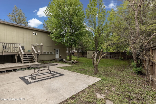 405 W 22nd Ave, Post Falls, ID 83854 - view of yard with a deck, a patio, an outbuilding, and a storage shed