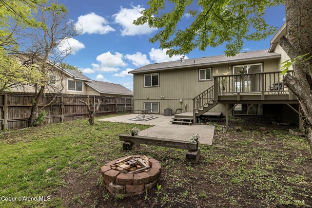 405 W 22nd Ave, Post Falls, ID 83854 - rear view of house featuring an outdoor fire pit, a patio, stairway, a deck, and cooling unit