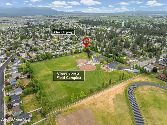 405 W 22nd Ave, Post Falls, ID 83854 - aerial overview of property's location with mountains