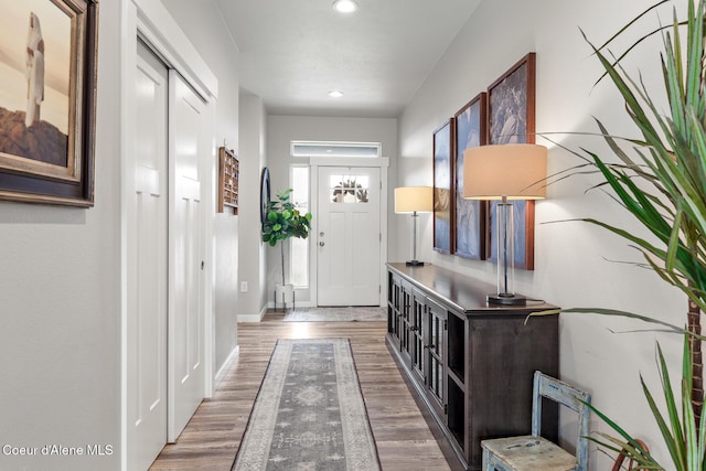 5441 W Gumwood Cir, Post Falls, ID 83854 - foyer entrance with baseboards, wood finished floors, and recessed lighting