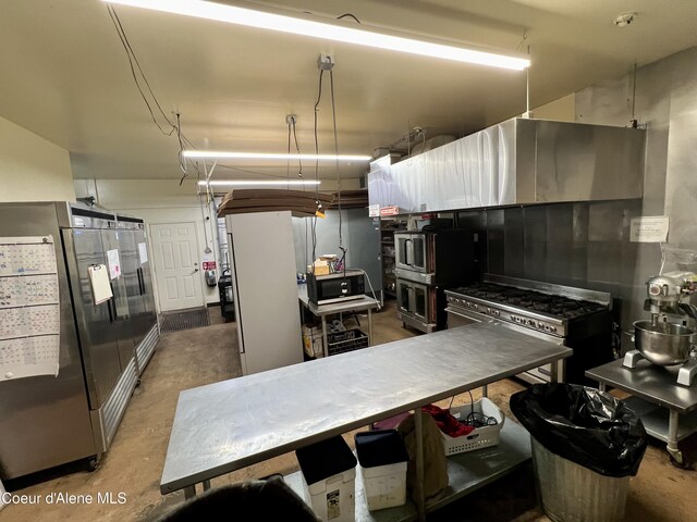 723 Pine St, Sandpoint, ID 83864 - kitchen featuring concrete flooring and stainless steel appliances