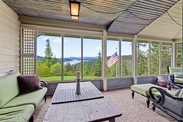 3467 E Sunset Dr, Harrison, ID 83833 - sunroom featuring a mountain view and outdoor lounge area