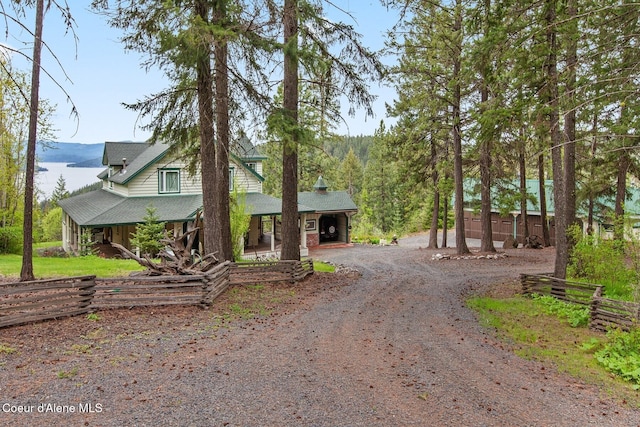 3467 E Sunset Dr, Harrison, ID 83833 - view of front of home featuring dirt driveway and covered porch