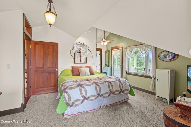 3467 E Sunset Dr, Harrison, ID 83833 - carpeted bedroom featuring vaulted ceiling and a ceiling fan