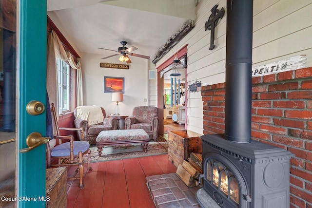3467 E Sunset Dr, Harrison, ID 83833 - sunroom with a wood stove