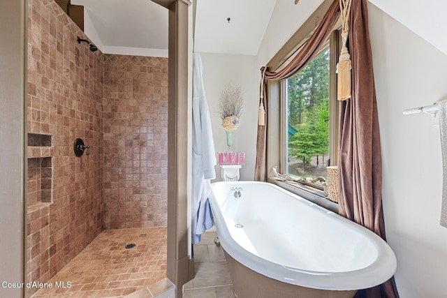 3467 E Sunset Dr, Harrison, ID 83833 - bathroom featuring a soaking tub, a tile shower, and tile patterned floors