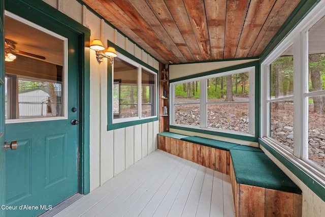 3467 E Sunset Dr, Harrison, ID 83833 - unfurnished sunroom with healthy amount of natural light and ceiling fan