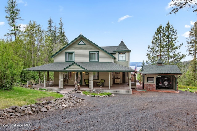 3467 E Sunset Dr, Harrison, ID 83833 - victorian home with dirt driveway and covered porch