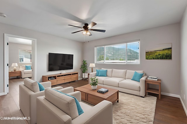1313 N Division Ave Unit B, Sandpoint, ID 83864 - living area featuring healthy amount of natural light, a ceiling fan, and wood finished floors