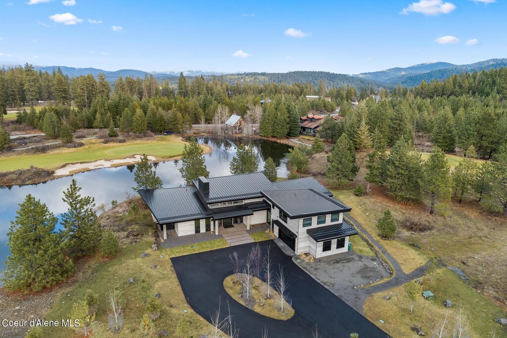 6922 S Nighthawk Ct, Harrison, ID 83833 - drone / aerial view with a water and mountain view and a forest view