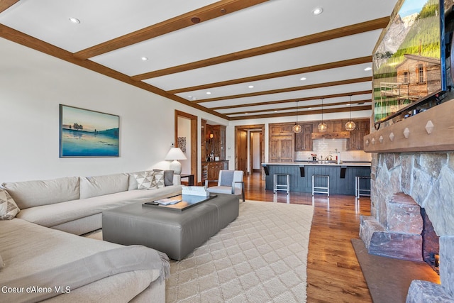 4669 S Arrow Point Dr # 210, Harrison, ID 83833 - living area with recessed lighting, light wood-type flooring, and beam ceiling