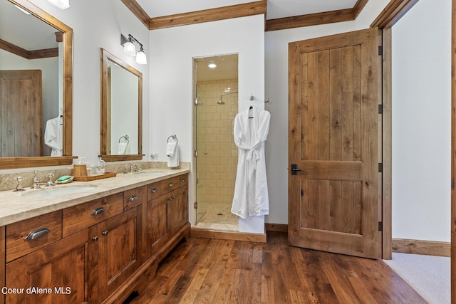 4669 S Arrow Point Dr # 210, Harrison, ID 83833 - full bath with ornamental molding, a sink, a stall shower, and wood finished floors