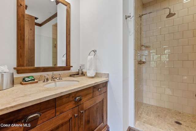 4669 S Arrow Point Dr # 210, Harrison, ID 83833 - bathroom featuring vanity, crown molding, and tiled shower