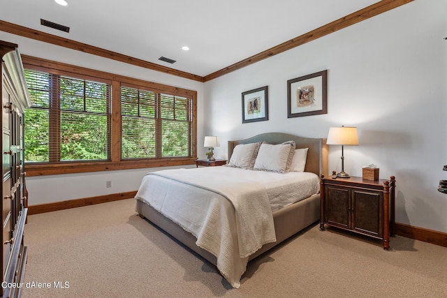 4669 S Arrow Point Dr # 210, Harrison, ID 83833 - bedroom featuring baseboards, ornamental molding, visible vents, and light colored carpet