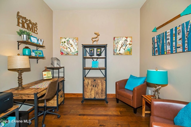 office area featuring baseboards and wood-type flooring