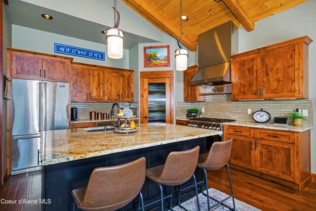 kitchen with stainless steel refrigerator, a sink, dark wood-style floors, exhaust hood, and wood ceiling