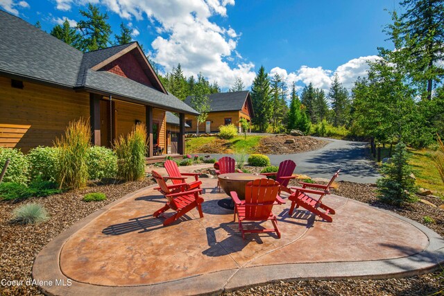 view of patio featuring a fire pit