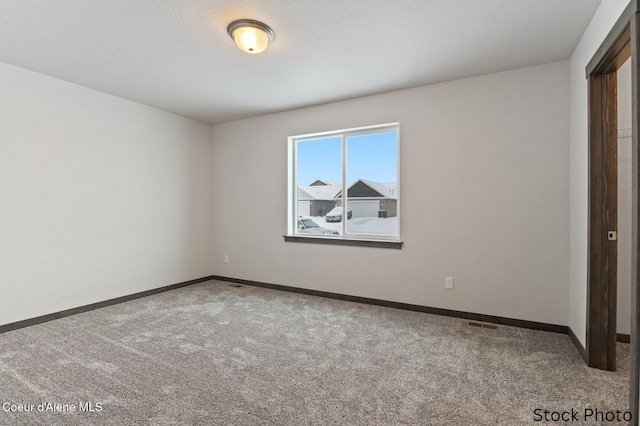 11669 N Railway Ave, Rathdrum, ID 83858 - unfurnished bedroom featuring carpet flooring and baseboards