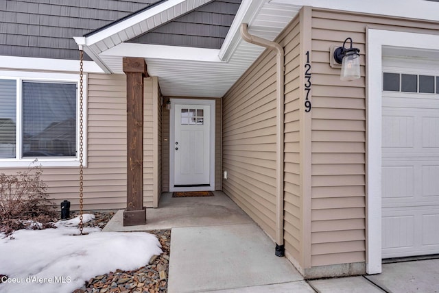 12379 N Cavanaugh Dr, Rathdrum, ID 83858 - view of exterior entry featuring a garage