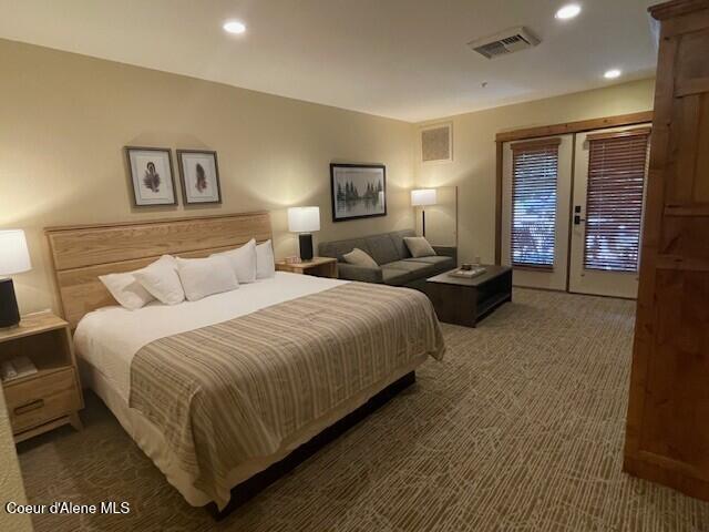 110 Morning Star Dr Unit 152, Kellogg, ID 83837 - bedroom with carpet floors, recessed lighting, and access to outside