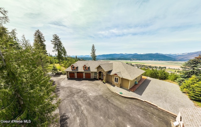 bird's eye view with a mountain view