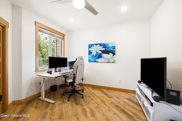 office with baseboards, light wood-type flooring, recessed lighting, and a ceiling fan