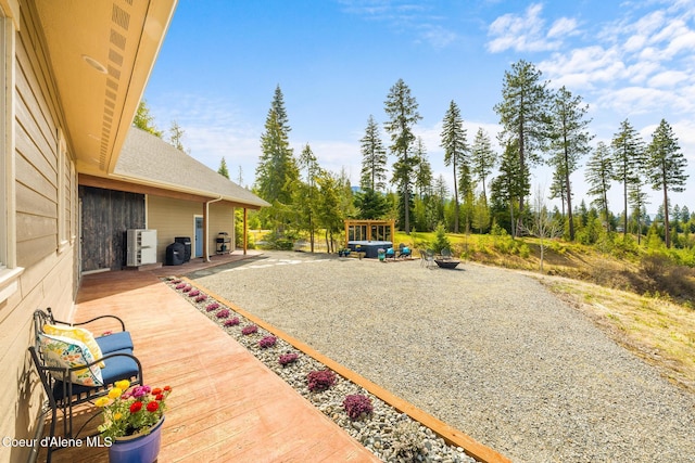view of patio with an outdoor fire pit