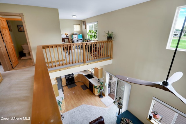 stairway with wood finished floors