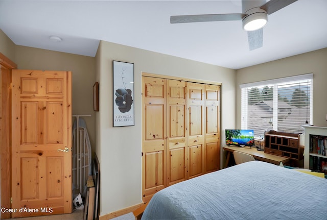 bedroom featuring a ceiling fan and a closet