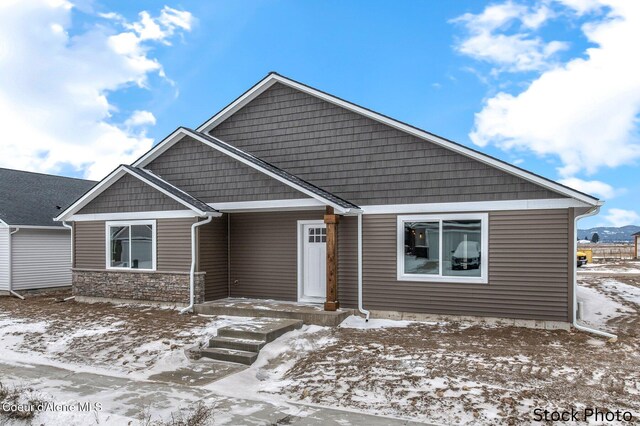 view of front of home with stone siding