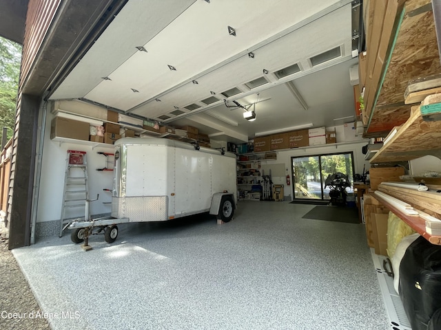 23 W Bay Wood Ln, Hope, ID 83836 - garage featuring a garage door opener