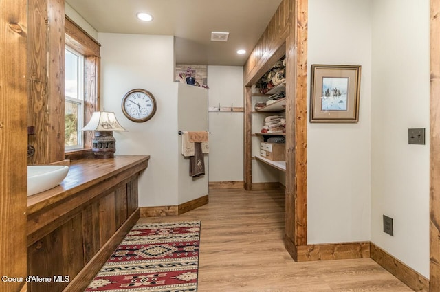 488 Fawn Ln, Bonners Ferry, ID 83805 - corridor featuring recessed lighting, light wood-style flooring, and baseboards