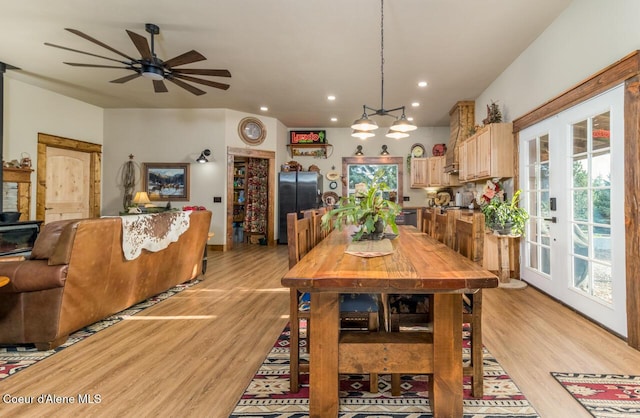 488 Fawn Ln, Bonners Ferry, ID 83805 - dining area with ceiling fan with notable chandelier, light wood-style floors, and recessed lighting