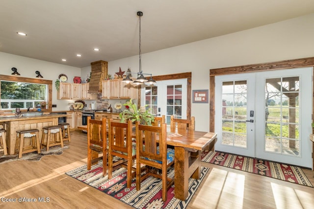488 Fawn Ln, Bonners Ferry, ID 83805 - dining room with recessed lighting, a chandelier, light wood-style flooring, and french doors
