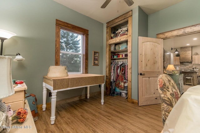 488 Fawn Ln, Bonners Ferry, ID 83805 - interior space with light wood-type flooring, a ceiling fan, and baseboards