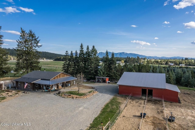 488 Fawn Ln, Bonners Ferry, ID 83805 - bird's eye view featuring a mountain view and a view of trees