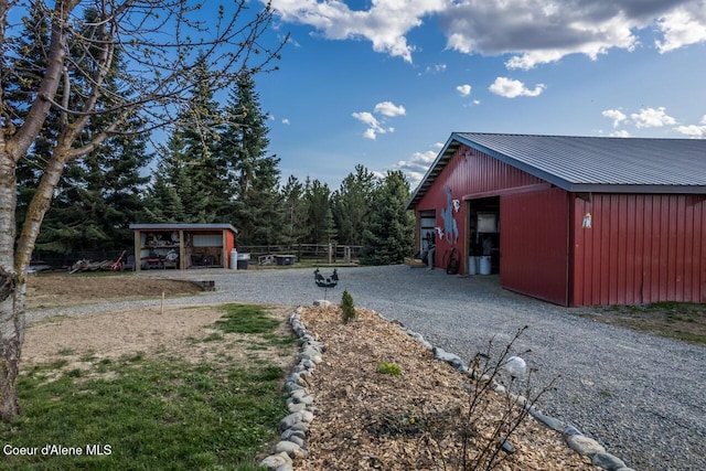 488 Fawn Ln, Bonners Ferry, ID 83805 - exterior space with driveway and an outbuilding